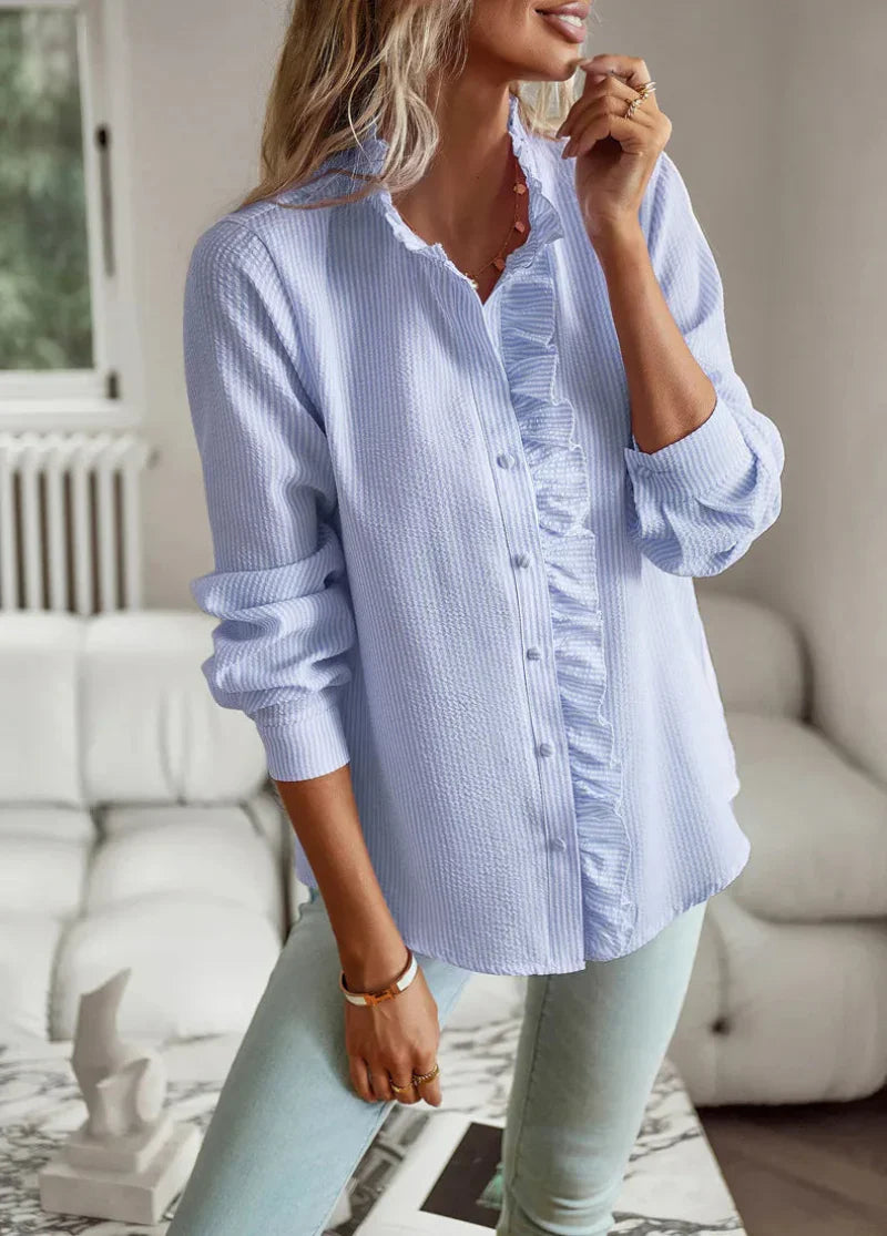 Elva Dames blouse met ruffle kraag en ribstructuur
