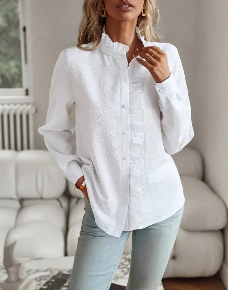 Elva Dames blouse met ruffle kraag en ribstructuur