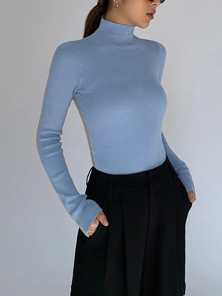 Elle dames coltrui met contrasterende mouwen