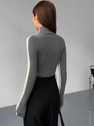 Elle dames coltrui met contrasterende mouwen