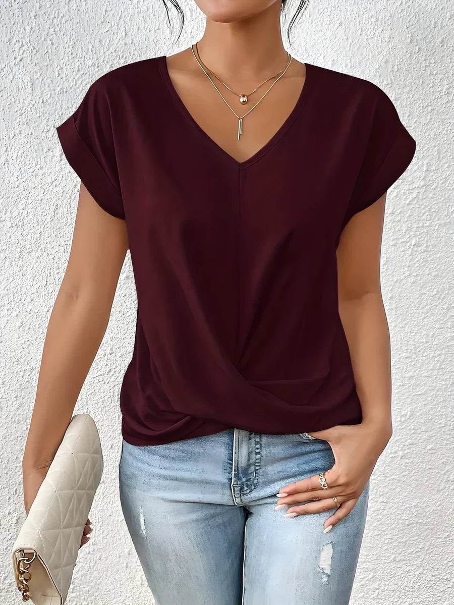 Nelle dames top met V-hals en gekruist detail